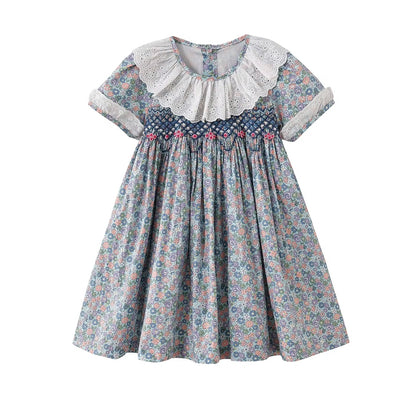 Handmade Smocking
Floral Dress